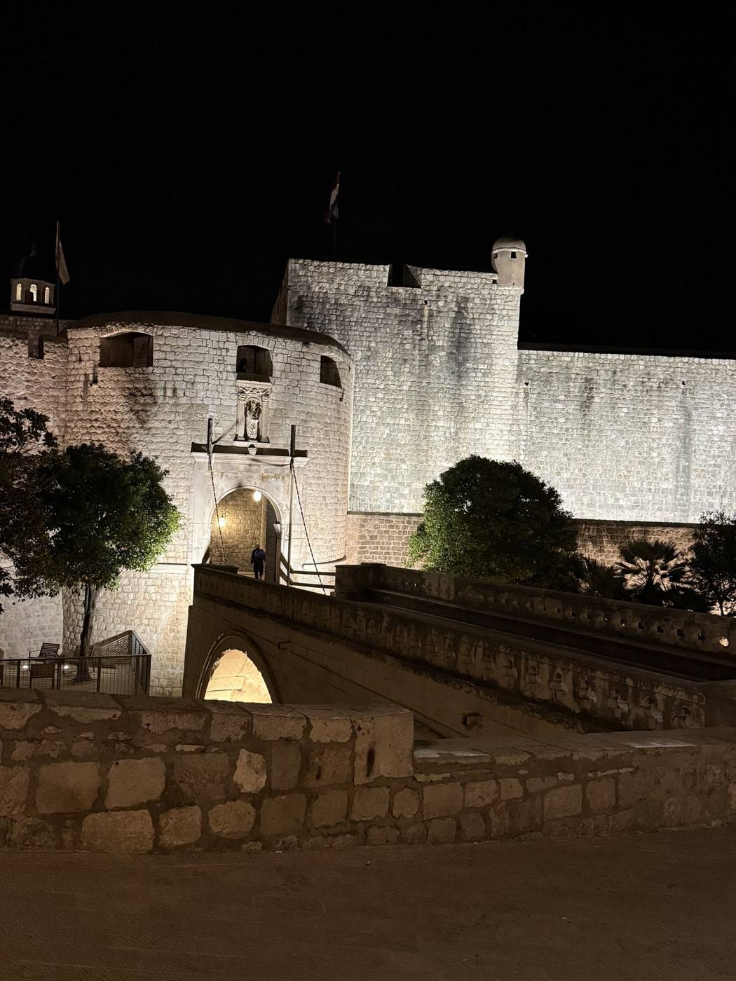 Pile Gate and the floodlit stone walls of Dubrovnik at night