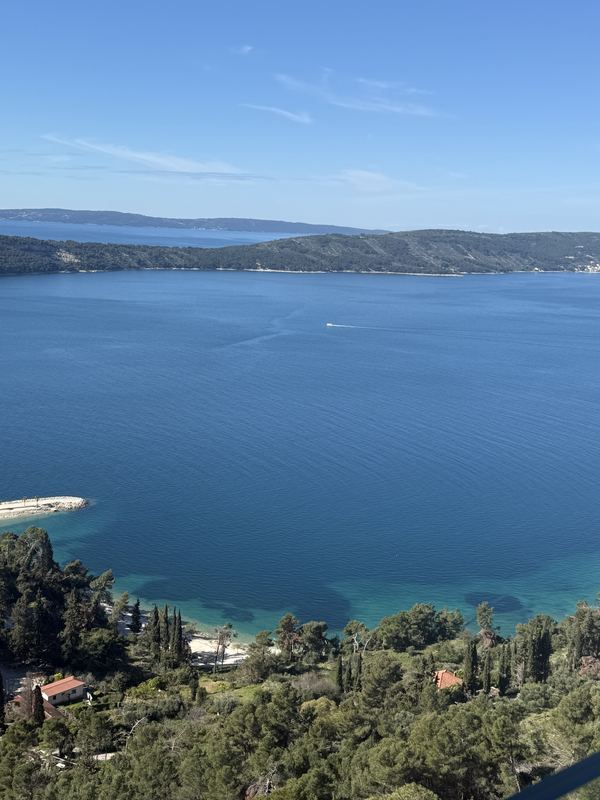 Deep blue Adriatic water and distant islands seen from a lookout on Marjan Hill