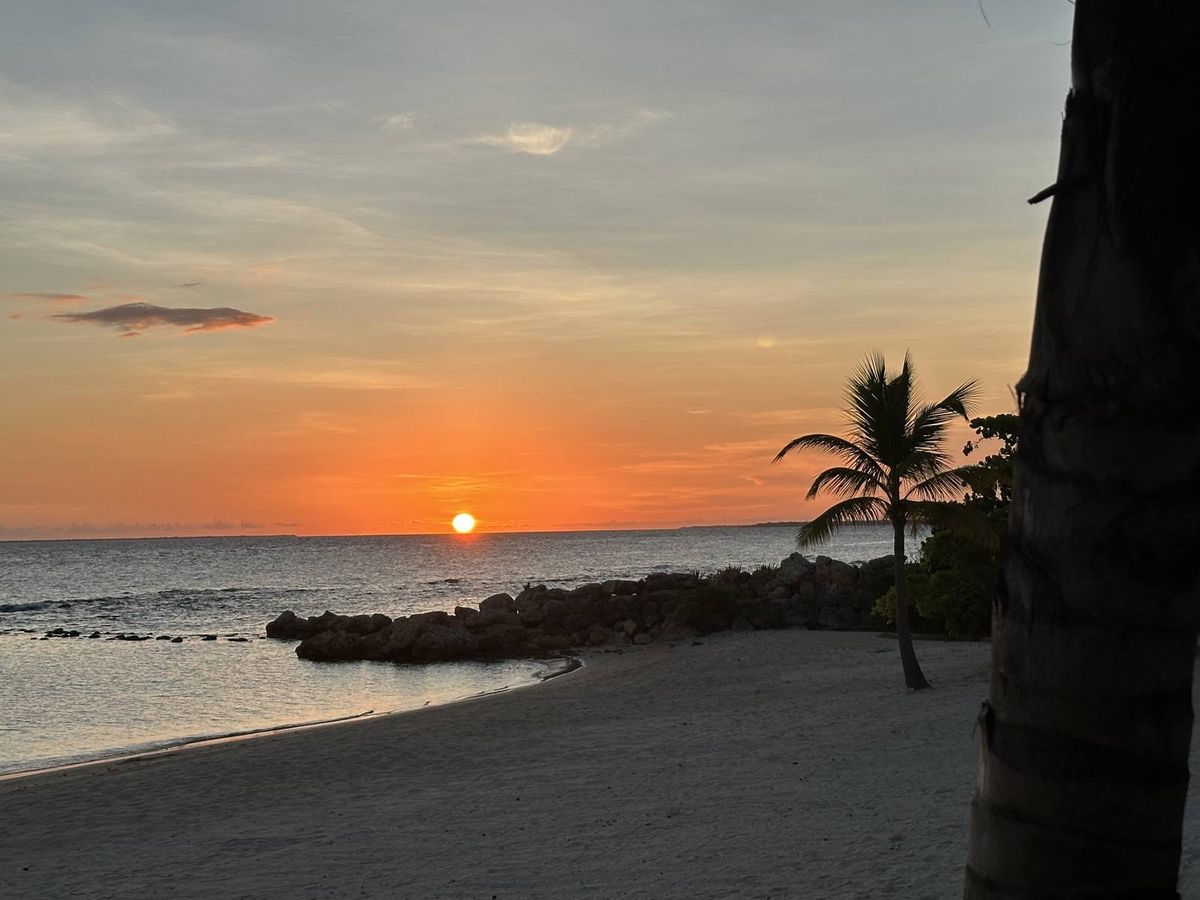 Orange sunset over the beach in the Dominican Republic